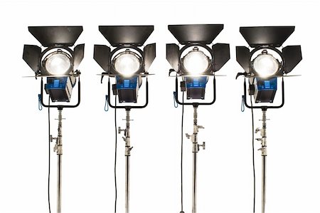 Four  searchlights on a white background. Stockbilder - Microstock & Abonnement, Bildnummer: 400-06096211