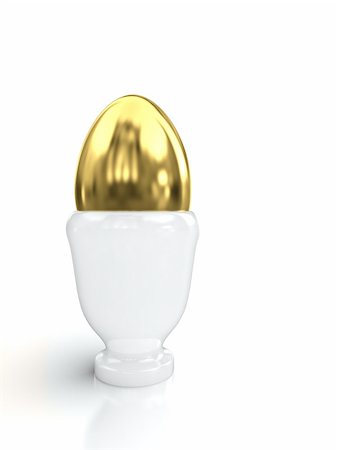 simsearch:400-04499320,k - Golden egg in egg cup isolated on white background. Fotografie stock - Microstock e Abbonamento, Codice: 400-06096236