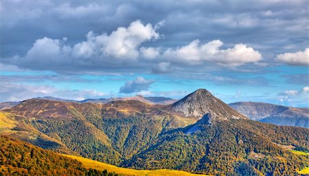 Beautiful image of the Central Massif,located in the south-central France.Here is the the largest concentration of extinct volcanoes in the world with approximately 450 volcanoes. Stock Photo - Budget Royalty-Free & Subscription, Code: 400-06096346