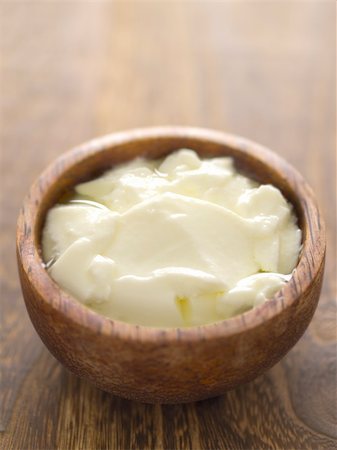 close up of a bowl of yogurt Foto de stock - Super Valor sin royalties y Suscripción, Código: 400-06096650