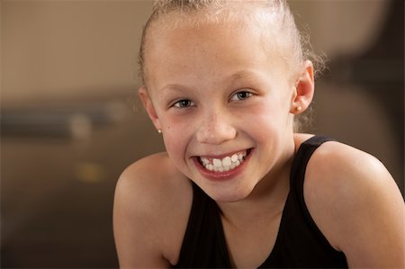 Close up of a happy biracial child dancer Foto de stock - Super Valor sin royalties y Suscripción, Código: 400-06097049