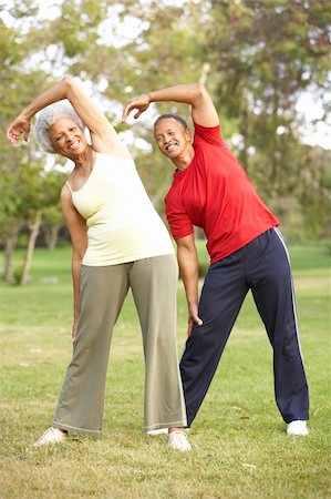 simsearch:400-05735475,k - Senior Couple Exercising In Park Stock Photo - Budget Royalty-Free & Subscription, Code: 400-06097469