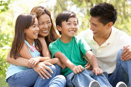 filipino family portrait - Family Enjoying Day In Park Stock Photo - Budget Royalty-Free & Subscription, Code: 400-06097516