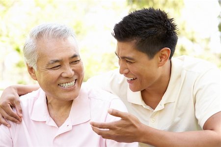 filipino family portrait - Father With Adult Son In Park Stock Photo - Budget Royalty-Free & Subscription, Code: 400-06097537