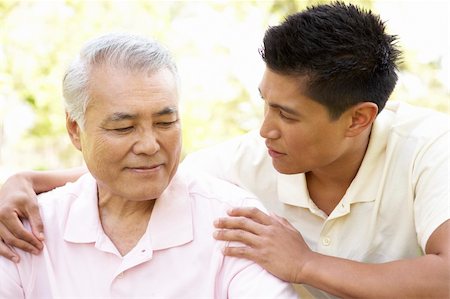 filipino family portrait - Father With Adult Son In Park Stock Photo - Budget Royalty-Free & Subscription, Code: 400-06097538