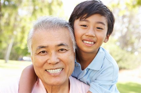 filipino family portrait - Grandfather With Grandson In Park Stock Photo - Budget Royalty-Free & Subscription, Code: 400-06097540