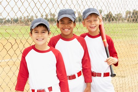 Young Boys In Baseball Team Stock Photo - Budget Royalty-Free & Subscription, Code: 400-06097767