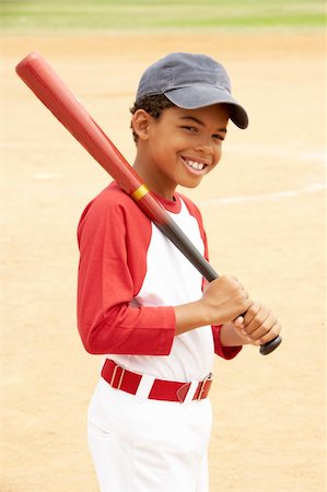 Young Boy Playing Baseball Stock Photo - Budget Royalty-Free & Subscription, Code: 400-06097779