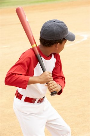Young Boy Playing Baseball Stock Photo - Budget Royalty-Free & Subscription, Code: 400-06097780