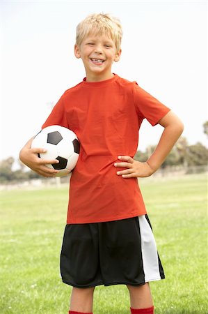 friends playing football - Young Boys In Football Team Stock Photo - Budget Royalty-Free & Subscription, Code: 400-06097798