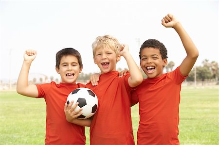 Young Girls In Football Team Celebrating Stock Photo - Budget Royalty-Free & Subscription, Code: 400-06097800