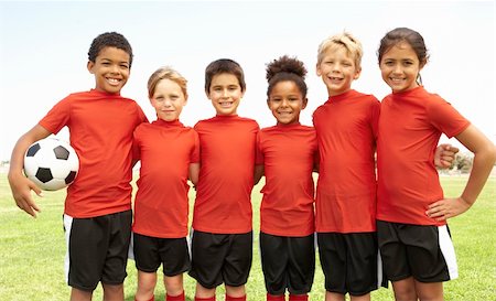 Young Boys And Girls In Football Team Stock Photo - Budget Royalty-Free & Subscription, Code: 400-06097802