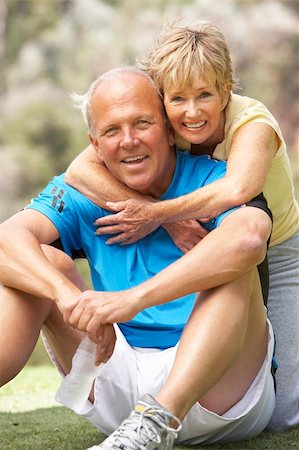 simsearch:400-05735475,k - Senior Couple Exercising In Park Stock Photo - Budget Royalty-Free & Subscription, Code: 400-06097862