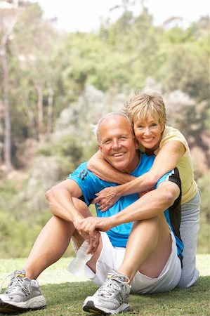 simsearch:400-05735475,k - Senior Couple Exercising In Park Stock Photo - Budget Royalty-Free & Subscription, Code: 400-06097863