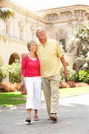 senior women city fun - Senior Couple Walking Through City Street Stock Photo - Budget Royalty-Free & Subscription, Code: 400-06097881