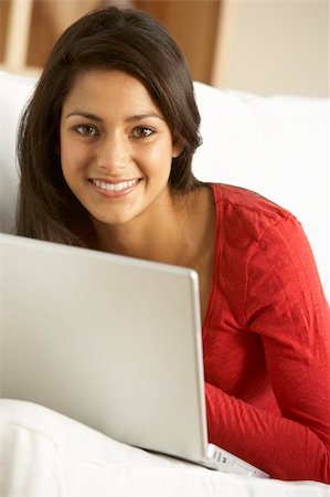 Young Woman Using Laptop At Home Stock Photo - Budget Royalty-Free & Subscription, Code: 400-06098102