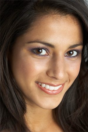 Portrait Of Smiling Young Woman Stock Photo - Budget Royalty-Free & Subscription, Code: 400-06098150