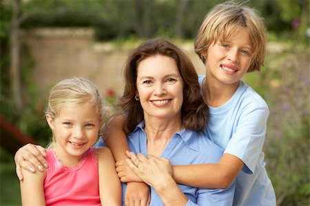 simsearch:400-06205100,k - Grandmother With Grandchildren In Garden Stock Photo - Budget Royalty-Free & Subscription, Code: 400-06098416