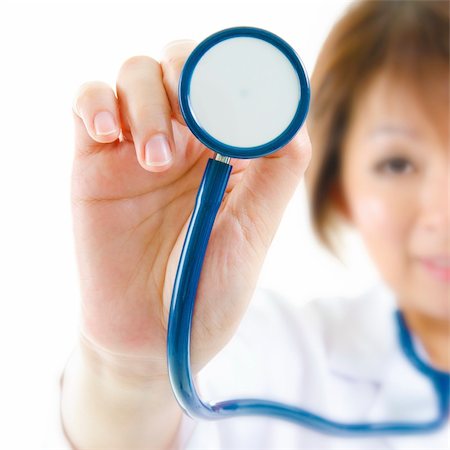 Stethoscope in a Asian female doctor hand Stock Photo - Budget Royalty-Free & Subscription, Code: 400-06098668
