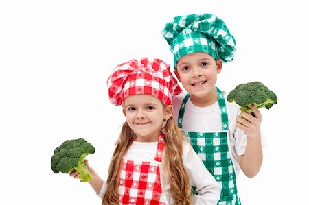 Happy chef kids holding broccoli - isolated Stock Photo - Budget Royalty-Free & Subscription, Code: 400-06098804