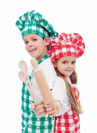 simsearch:400-04114221,k - Happy chef kids holding wooden cooking utensils and smiling - isolated Stock Photo - Budget Royalty-Free & Subscription, Code: 400-06098801