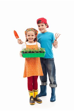 farmer help - Kids prepared to plant the seedlings - growing food, isolated Stock Photo - Budget Royalty-Free & Subscription, Code: 400-06098832