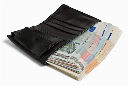 many banknotes in black wallet on light background Stock Photo - Budget Royalty-Free & Subscription, Code: 400-06099752