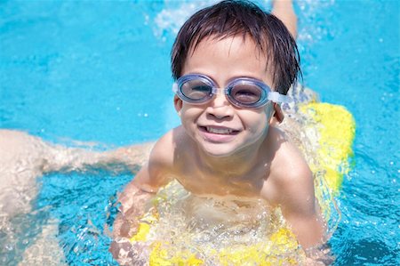 simsearch:400-04731600,k - happy boy in Swimming Pool Stock Photo - Budget Royalty-Free & Subscription, Code: 400-06090365