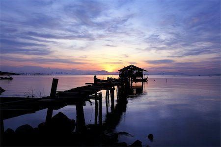 elevated sky - Mystery sunrise in tropical fisherman village. Stock Photo - Budget Royalty-Free & Subscription, Code: 400-06090387