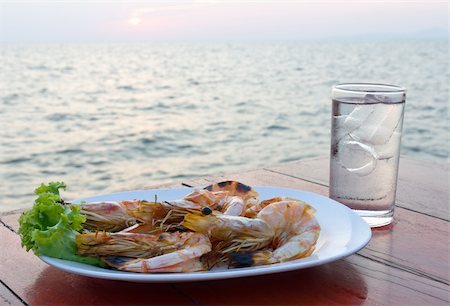 dinner at a beach - Grilled shrimp at a seaside restaurant in Thailand Stock Photo - Budget Royalty-Free & Subscription, Code: 400-06091173