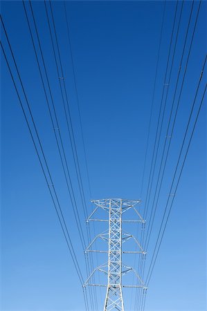 simsearch:400-04782405,k - High voltage power pole against blue sky Photographie de stock - Aubaine LD & Abonnement, Code: 400-06091582