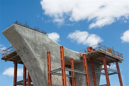 freeway and city and sky - fragment  view  of the road under reconstruction Stock Photo - Budget Royalty-Free & Subscription, Code: 400-06091606