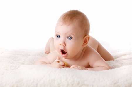 funny baby surprised expression - small child on the floor Stock Photo - Budget Royalty-Free & Subscription, Code: 400-06091725