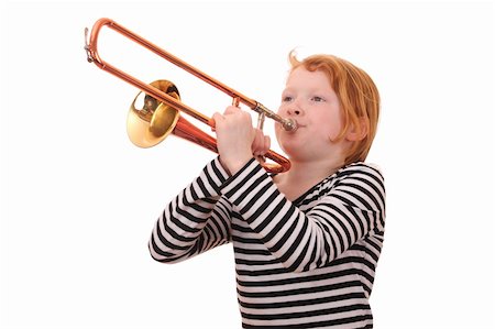 Young girl playing a trombone on white background Stock Photo - Budget Royalty-Free & Subscription, Code: 400-06092005