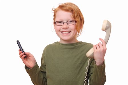 Young girl with cell phone and old phone Stock Photo - Budget Royalty-Free & Subscription, Code: 400-06092018