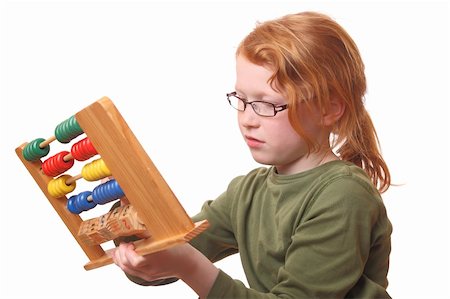 simsearch:400-05682310,k - Young girl playing with an abacus on white background Stockbilder - Microstock & Abonnement, Bildnummer: 400-06092021