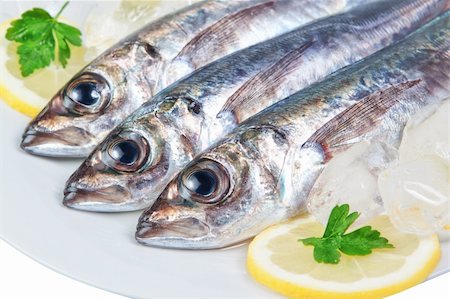 Three raw mackerel in the macro. Stock Photo - Budget Royalty-Free & Subscription, Code: 400-06092282
