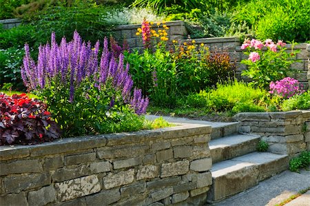 pic of house yard walkway - Natural stone landscaping in home garden with steps and flowerbeds Stock Photo - Budget Royalty-Free & Subscription, Code: 400-06092331