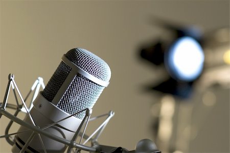 simsearch:400-04867557,k - Microphone in studio. Dark blue light. Stock Photo - Budget Royalty-Free & Subscription, Code: 400-06092698