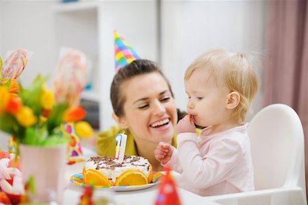 simsearch:400-06076022,k - Mother spending fun time with baby on birthday party Photographie de stock - Aubaine LD & Abonnement, Code: 400-06093162