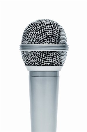 simsearch:400-04348398,k - Beautiful new microphone on a white background Fotografie stock - Microstock e Abbonamento, Codice: 400-06093848