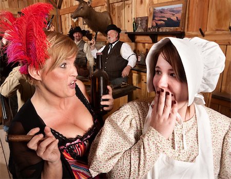 smoking cigars friends - Two ladies gossiping in an American old west tavern Stock Photo - Budget Royalty-Free & Subscription, Code: 400-06104098