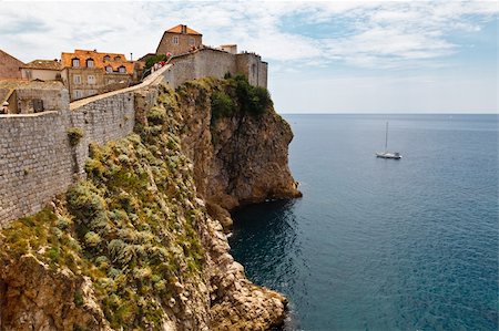 Yacht Approaching Impregnable Walls of Dubrovnik, Croatia Stock Photo - Budget Royalty-Free & Subscription, Code: 400-06104147