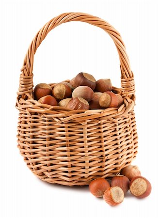 simsearch:400-05194830,k - Wicker basket with hazelnuts isolated on a white background Stockbilder - Microstock & Abonnement, Bildnummer: 400-06104607