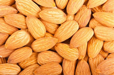 Whole almond nuts closeup, may be used as background Stock Photo - Budget Royalty-Free & Subscription, Code: 400-06104608