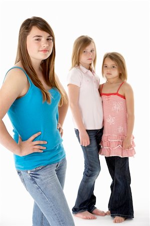 sibling sad - Group Of Girls Together In Studio Looking Unhappy Stock Photo - Budget Royalty-Free & Subscription, Code: 400-06104829