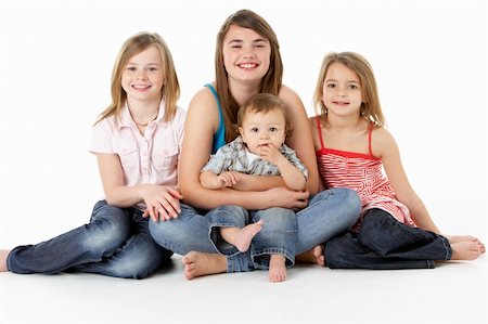 sister hugs baby - Group Of Children Together In Studio Stock Photo - Budget Royalty-Free & Subscription, Code: 400-06104835