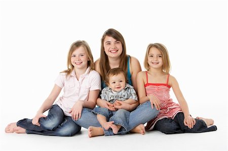 sister hugs baby - Group Of Children Together In Studio Stock Photo - Budget Royalty-Free & Subscription, Code: 400-06104836