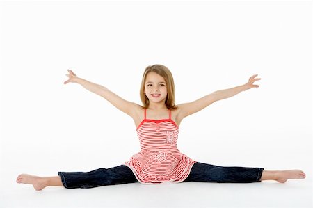 Young Girl In Gymnastic Pose Doing Splits Stock Photo - Budget Royalty-Free & Subscription, Code: 400-06104844