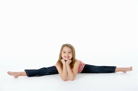 Young Girl In Gymnastic Pose Doing Splits Stock Photo - Budget Royalty-Free & Subscription, Code: 400-06104843
